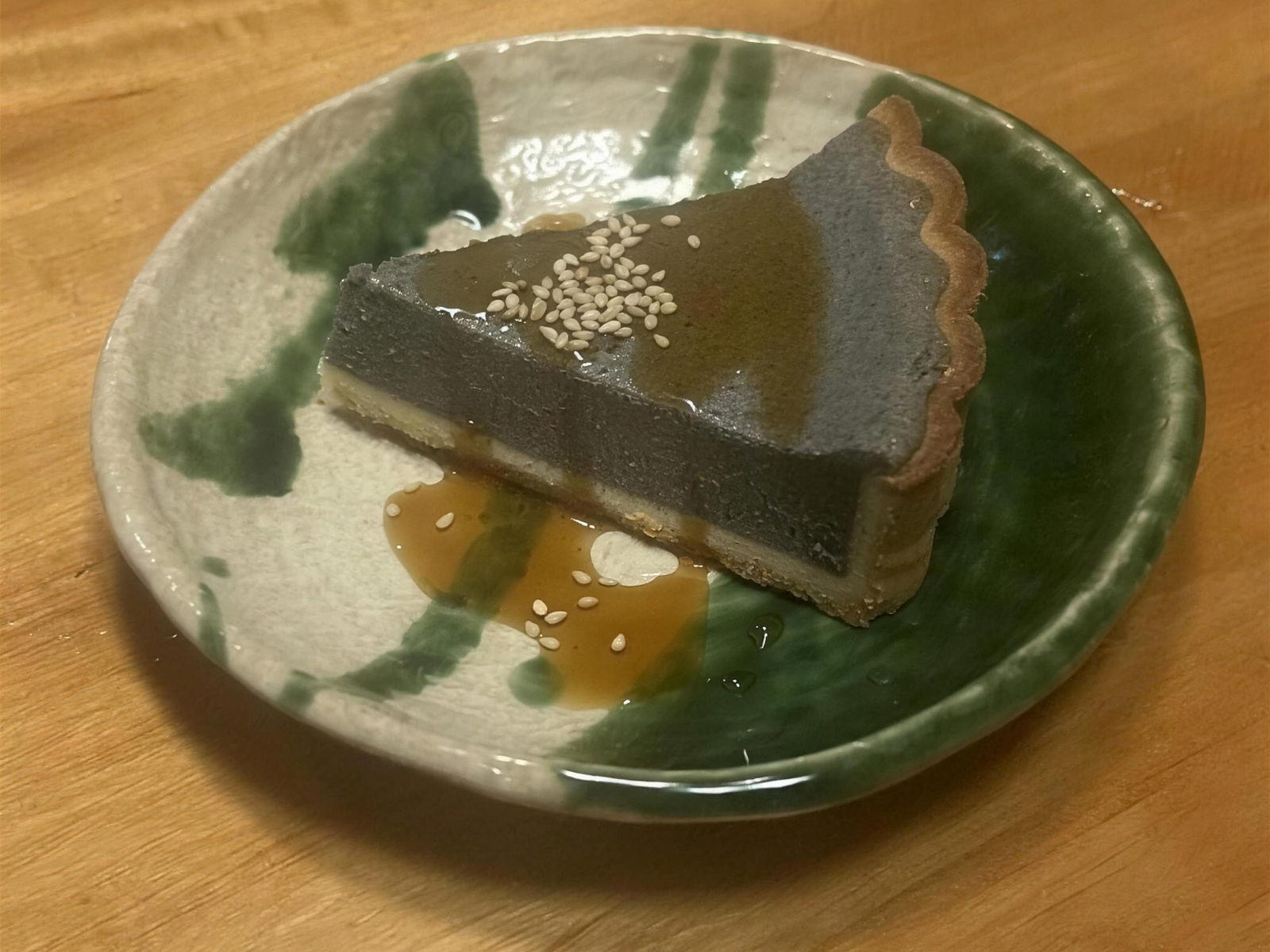 Rich black sesame cheesecake tart